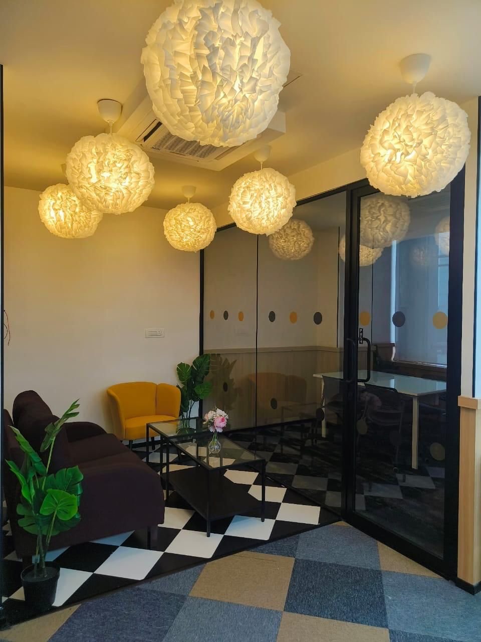 Lounge with statement globe pendant lights