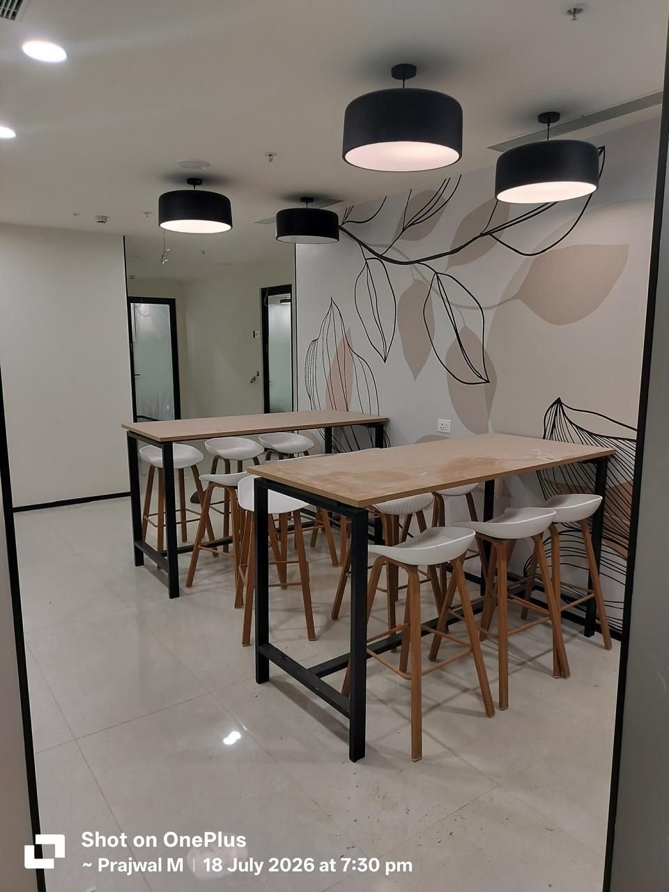 Pantry area with high-top tables